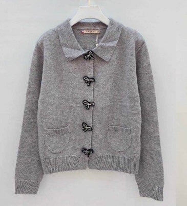 Hiltons vest with ribbon buttons